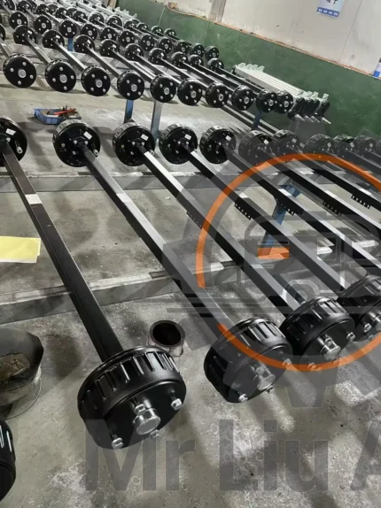 Customized 1350 KG Trailer Straight Axle With Knott 200x 50 Drum Brake for Cargo& Horse Trailers in workshop